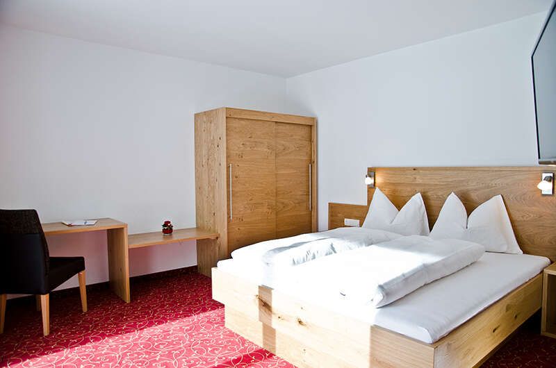 Schlafzimmer im Appartement Top 3 im Chalet Barbara